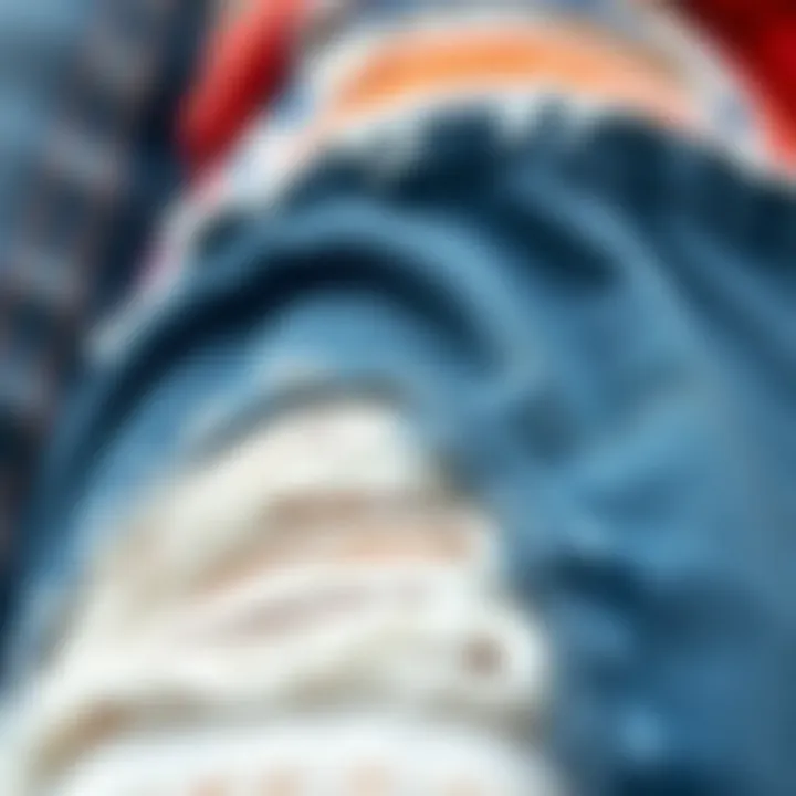 A textured fabric swatch demonstrating the variety of colors used in colorblock ripped jeans.