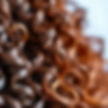 Close-up of curly colored clip-in hair extensions showcasing texture and color variety