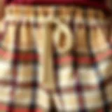 Close-up of drawstring waist plaid pants showcasing fabric texture