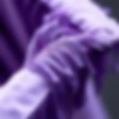 Intricate Detail of Purple Fringe Trim Close-up of purple fringe trim detailing on fabric