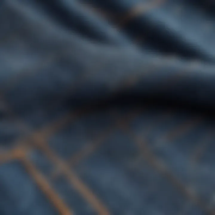 A close-up of denim fabric with intricate details