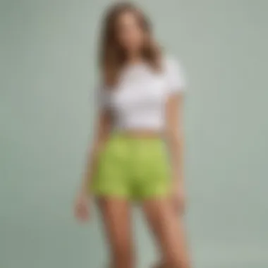 Casual outfit featuring lime green high waisted shorts and sneakers