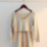 Elegant ribbed pants and top set displayed on a minimalist hanger
