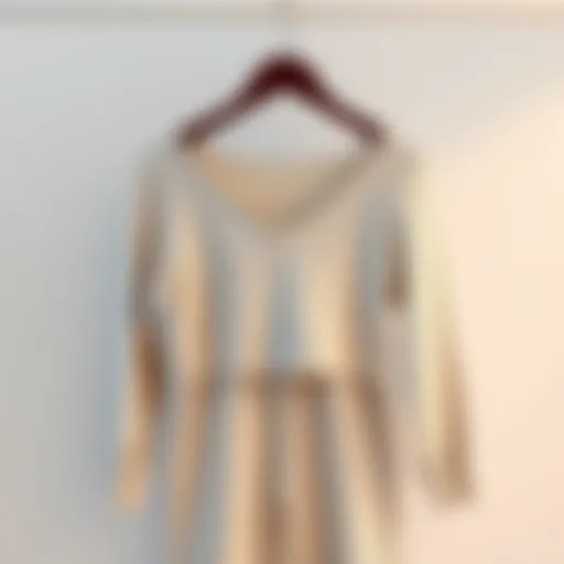 Elegant ribbed pants and top set displayed on a minimalist hanger