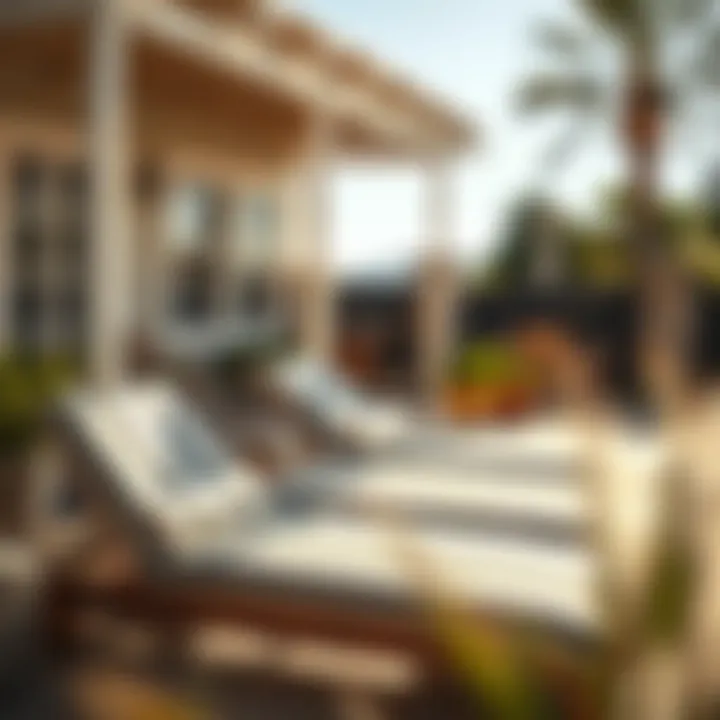 Outdoor setting featuring a stripe chaise lounge under sunlight