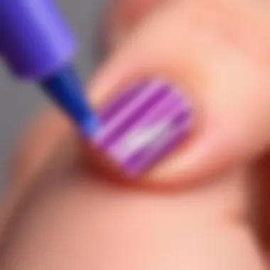 Close-Up of Nail Polish Strip Application Close-up of beautifully applied nail polish strips on a manicured nail