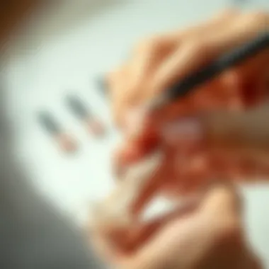 Application Technique of Press-On Nails Close-up view of a person applying press-on nails with precision