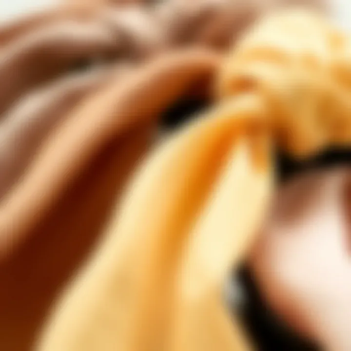 Close-up of fabric textures used in wide hair ties, highlighting different materials and their benefits.