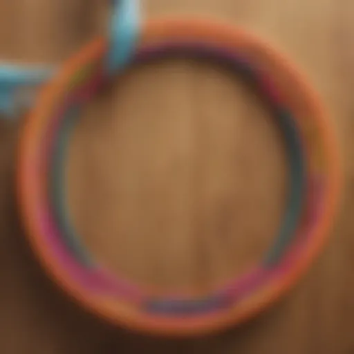 A vibrant weighted padded hula hoop on a wooden floor